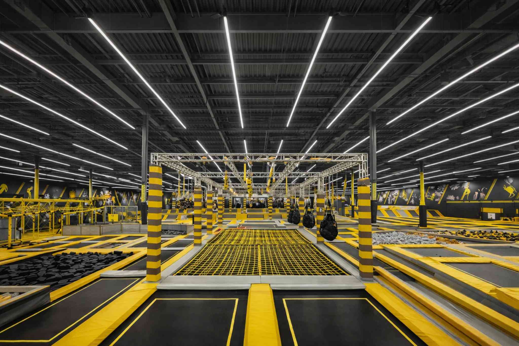 Trampoline park management dashboard showing sessions, waivers, and capacity